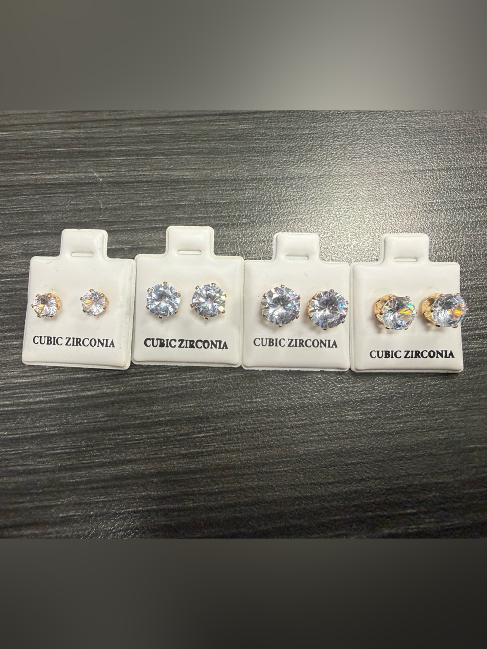4 pairs of new gold toned CZ earring studs 5mm-8mm